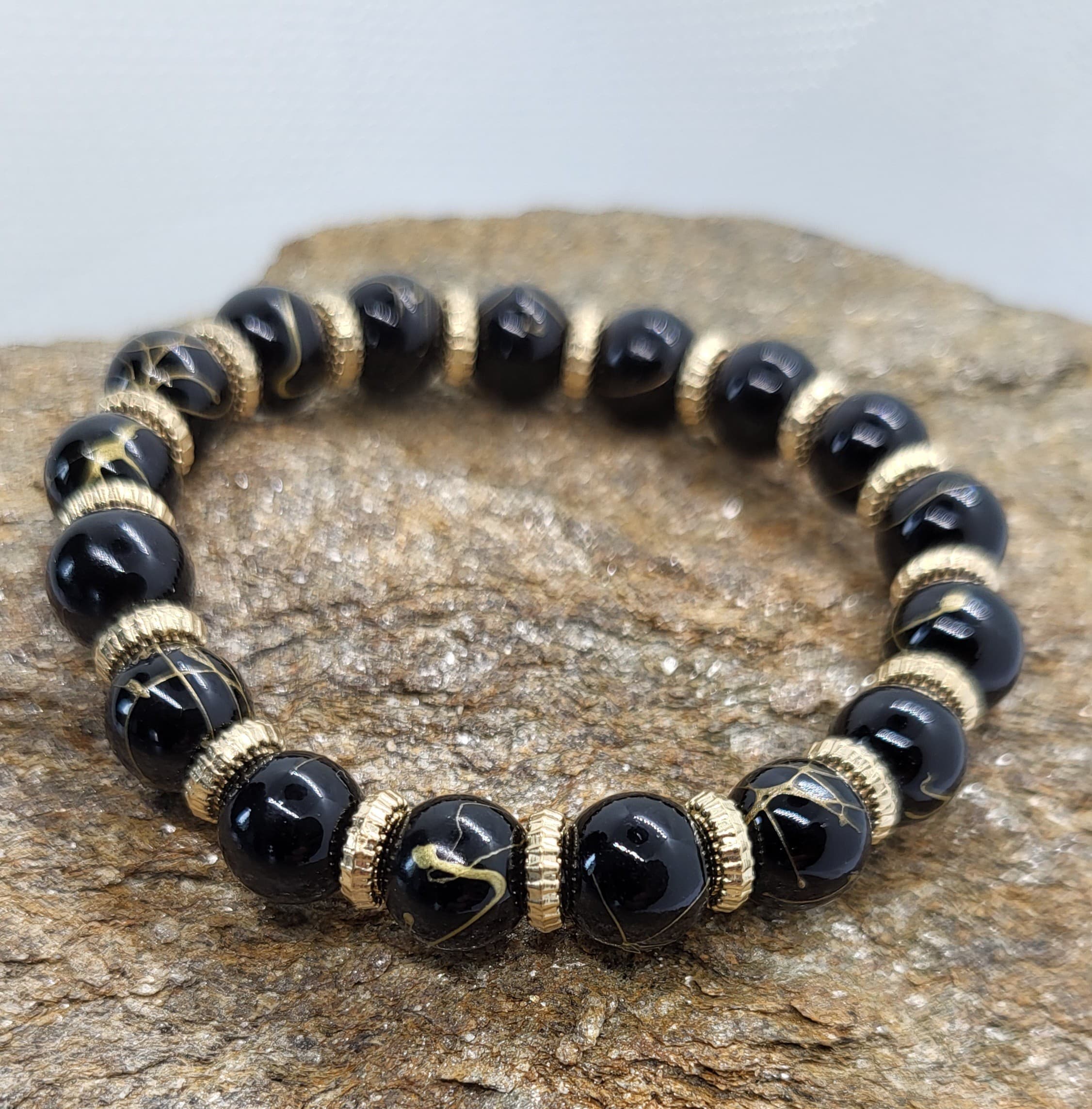 Bracelet Perles Noires et Fils d'Or